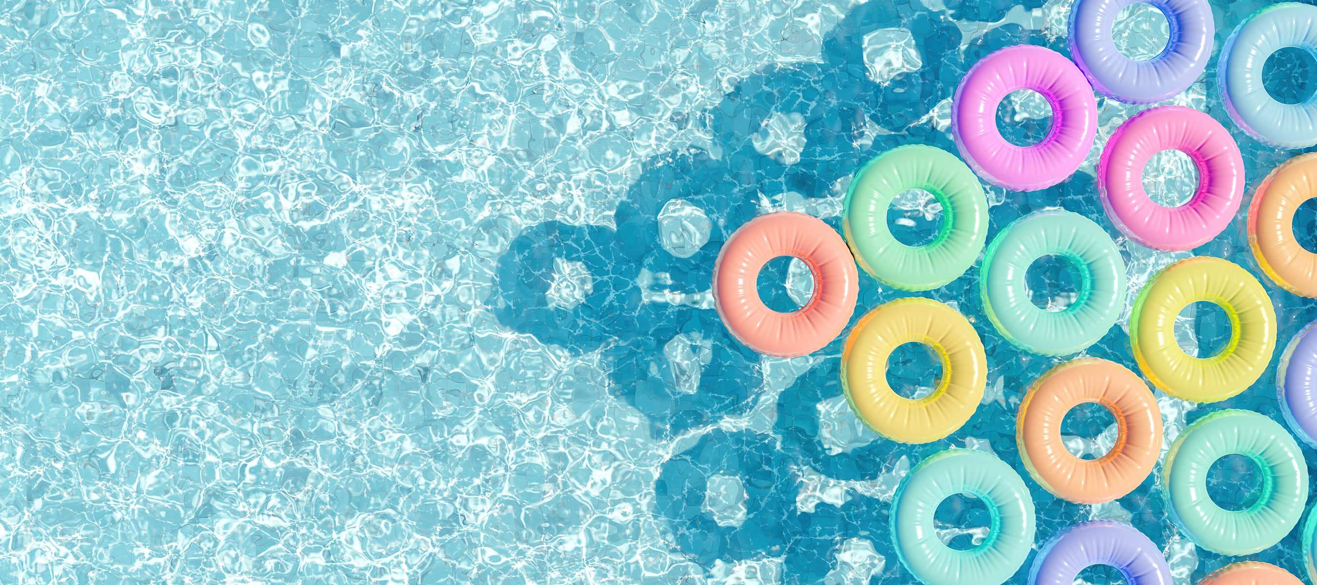 Colorful Round Pool Floats in a Swimming Pool